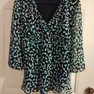 Women's Blouse that Ties in the back. Very Cute!